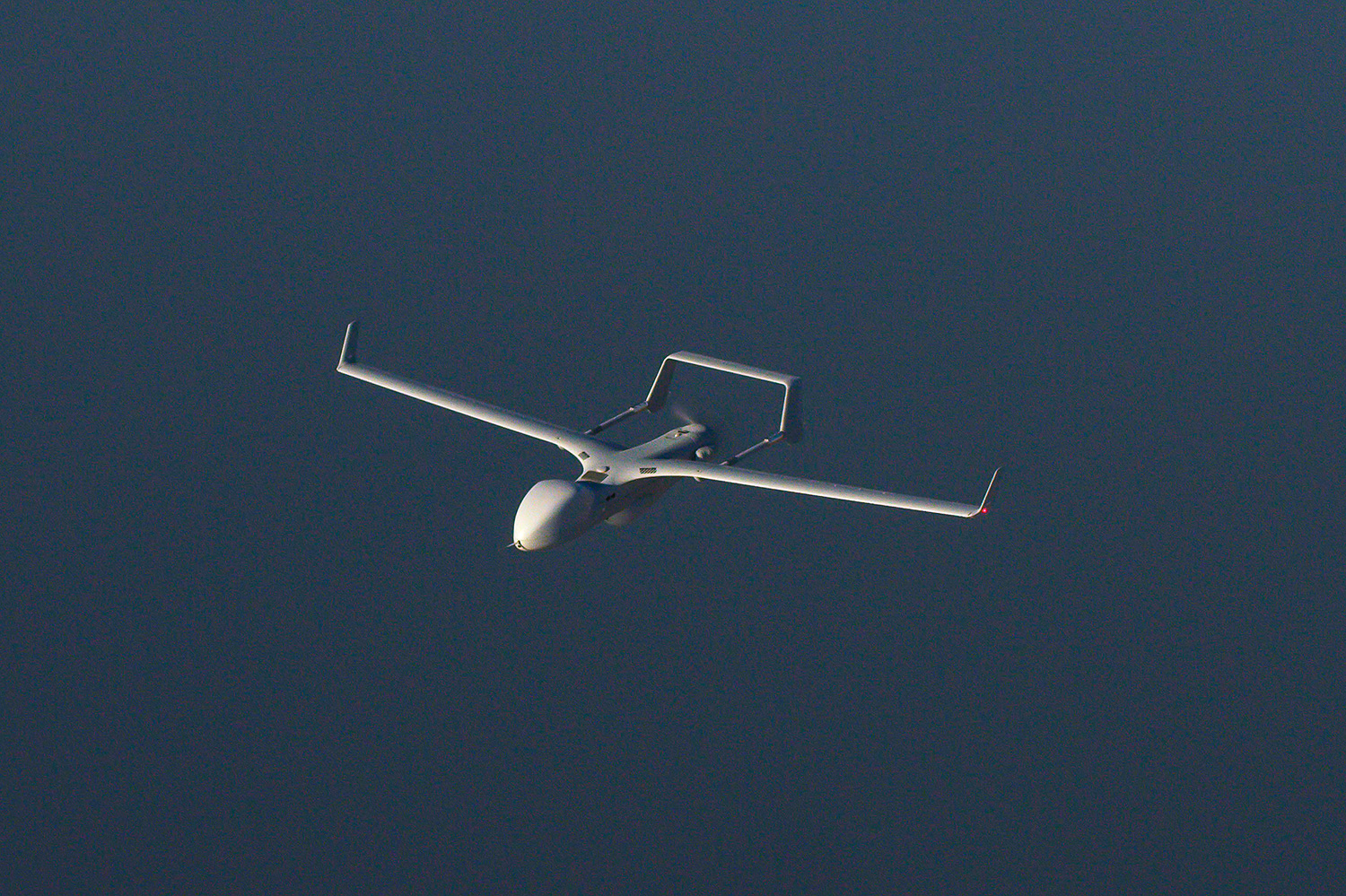 Blackjack Extended Range flying over water.